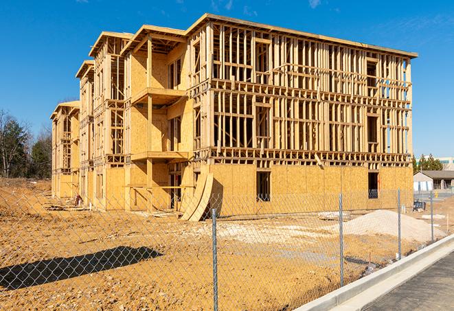 a snapshot of temporary chain link fences protecting a large construction project from unauthorized access in Parlin, NJ